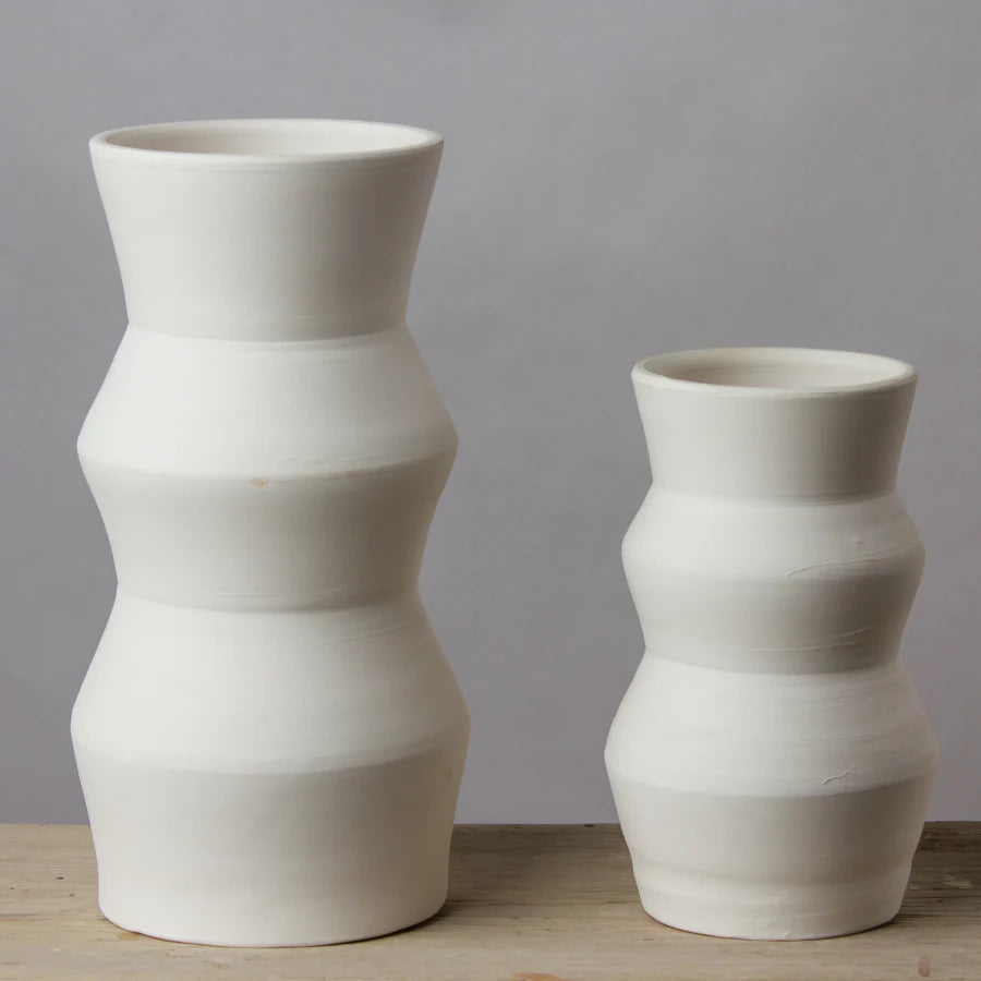 White clay saw vase